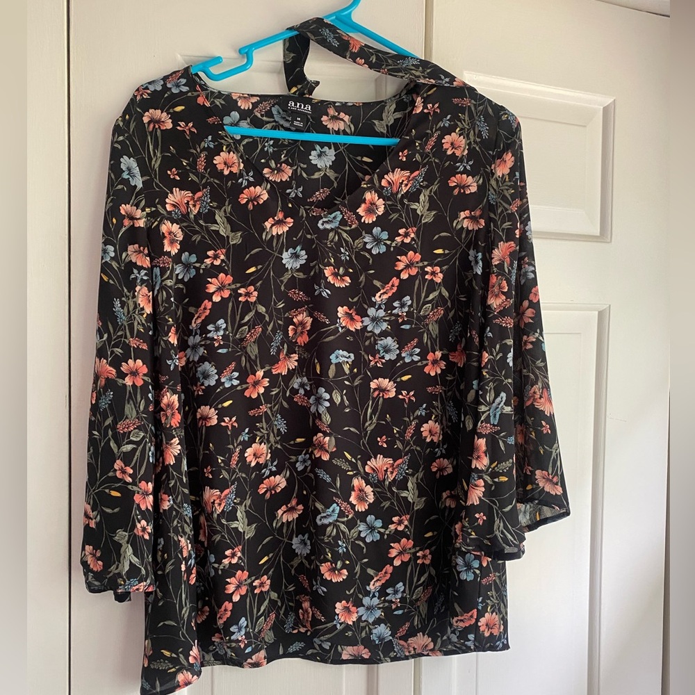 Blouse. Size medium. Tie around neck.